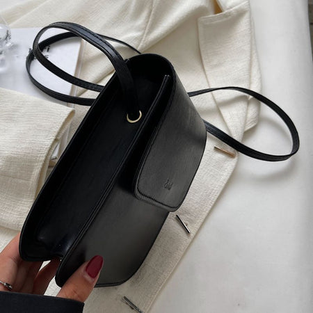 Bolsa-Feminina-Pequena-Couro-Portatil-1